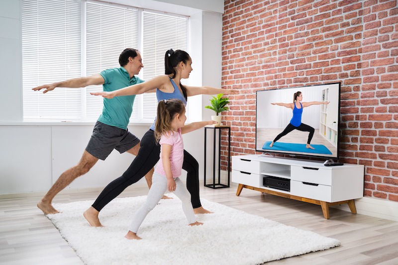family doing yoga